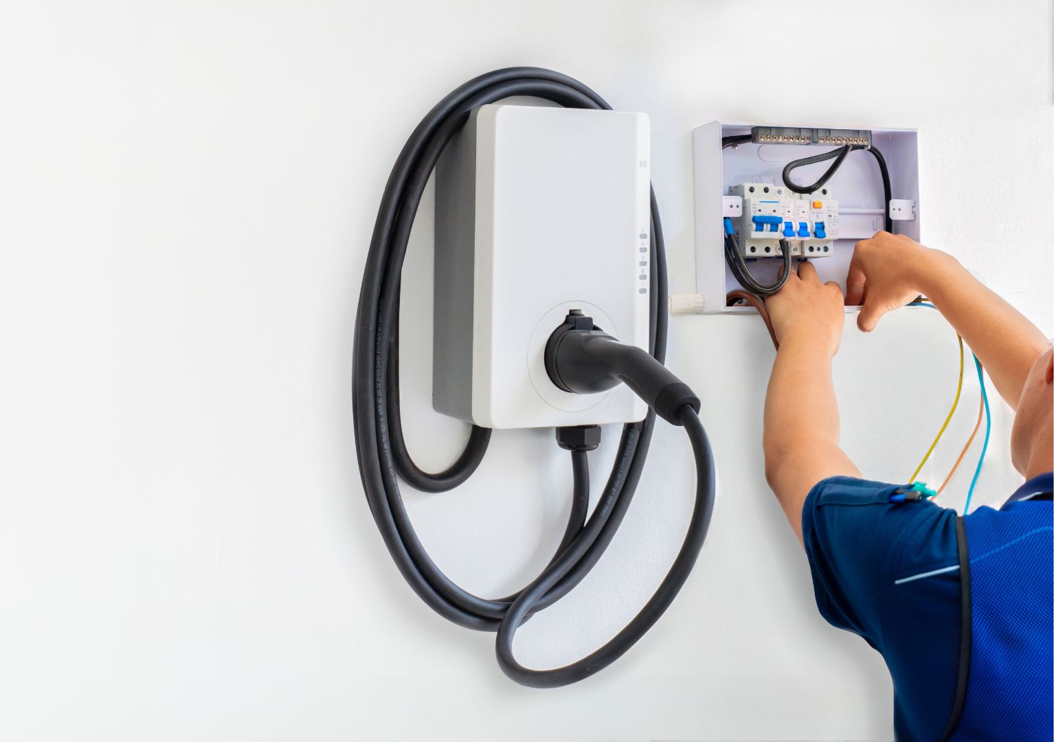 electrician installing ev charging point